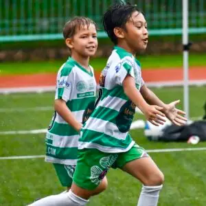 kids playing SYL football match Singapore Youth League academy team