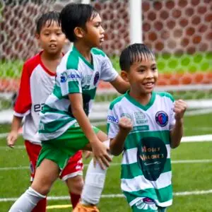 kids celebrating SYL football league match win in Singapore