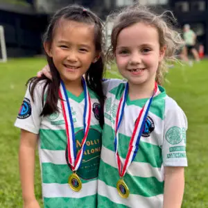 girl youth football players smiling during training programme in Singapore